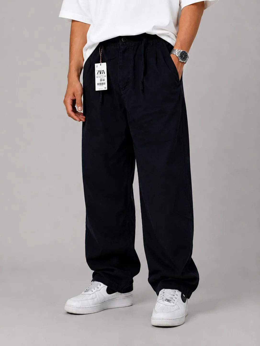 Baggy-Style-Fabric-Pants-Black-Lycra-Fabric-Cocoon-heroshoop.webp شلوار پارچه ای بگ استایل /پارچه لیوسل رنگ مشکی / پیله دار - تصویر 1
