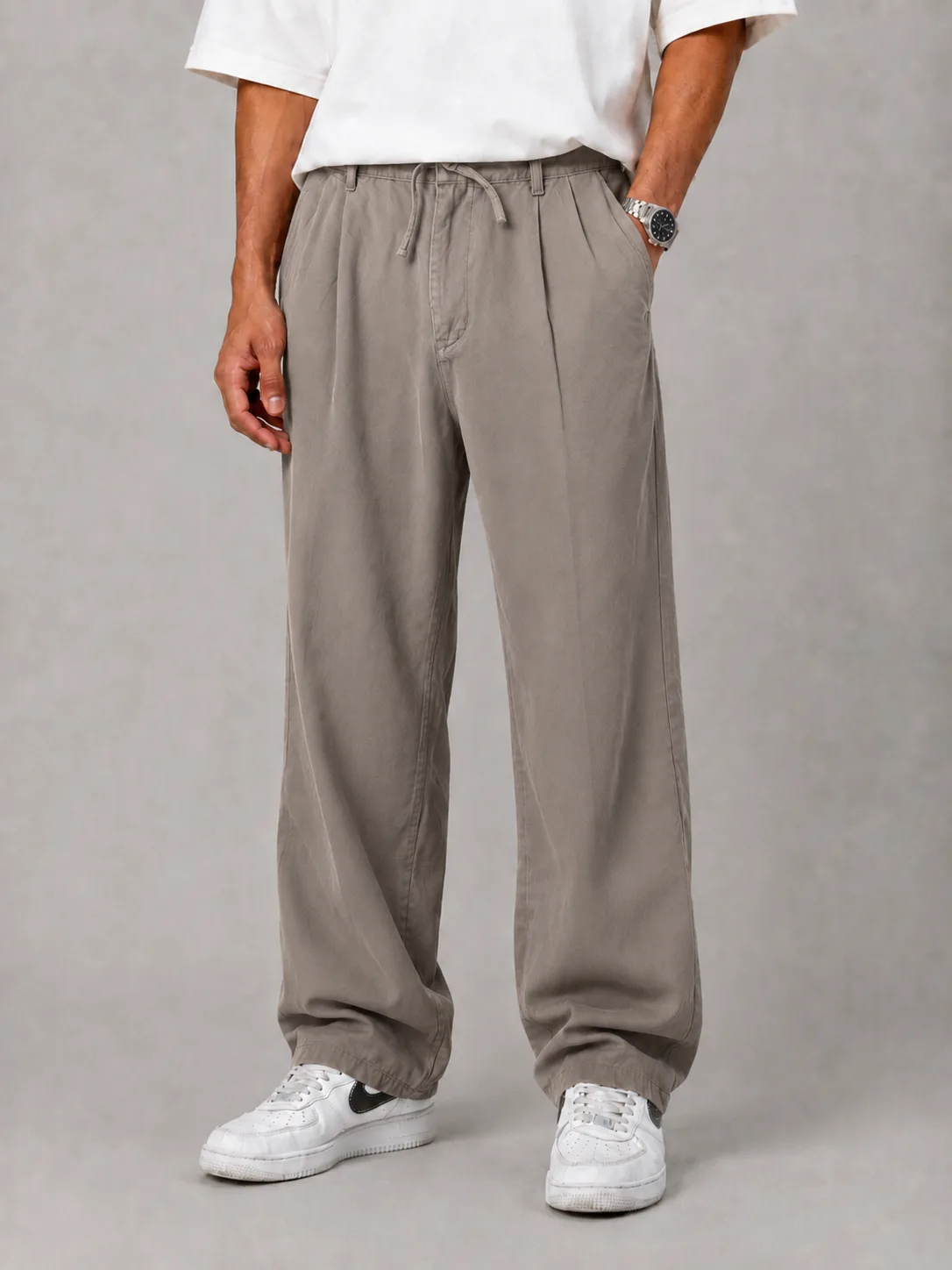 Baggy-style-fabric-pants-cream-color-lyocell-fabric-perfect-for-the-season-heroshoop.webp شلوار پارچه ای بگ استایل پیله دار / پارچه لیوسل رنگ کرم 2 درجه یک / مناسب فصل - تصویر 1
