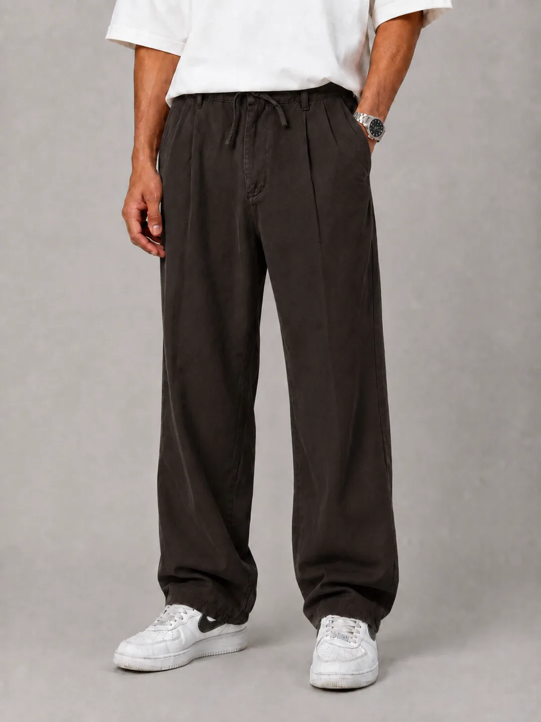 Baggy-style-fabric-pants-lyocell-fabric-chocolate-color-suitable-for-the-season-heroshoop.webp شلوار پارچه ای بگ استایل / پارچه لیوسل رنگ قهوه ای / پیله دار / مناسب فصل - تصویر 1