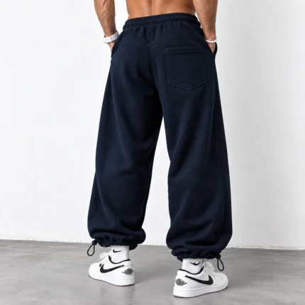 Baggy-style-joggers-3-thread-French-terry-cotton-Length-110-cm-Elastic-waistband-Adjustable-cuffs-with-toggles-Navy-blue-Code-8005-www.heroshoop.com-view-2.webp
