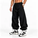 Baggy-style-joggers-Elastic-waistband-Adjustable-cuffs-with-stoppers-Black-Code-8006-www.heroshoop.com-View-1.webp