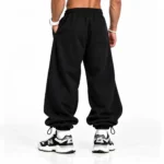 Baggy-style-joggers-Elastic-waistband-Adjustable-cuffs-with-stoppers-Black-Code-8006-www.heroshoop.com-View-2.webp