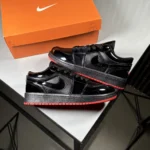 Jordan-One-Low-Top-Sneakers-_-Black-with-Red-Sole-_-www.heroshoop.com-_-View-1.webp