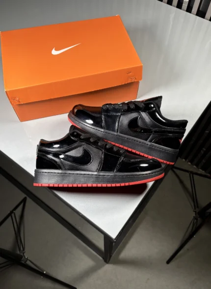 Jordan-One-Low-Top-Sneakers-_-Black-with-Red-Sole-_-www.heroshoop.com-_-View-1.webp