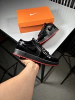 Jordan-One-Low-Top-Sneakers-_-Black-with-Red-Sole-_-www.heroshoop.com_-View-2.webp
