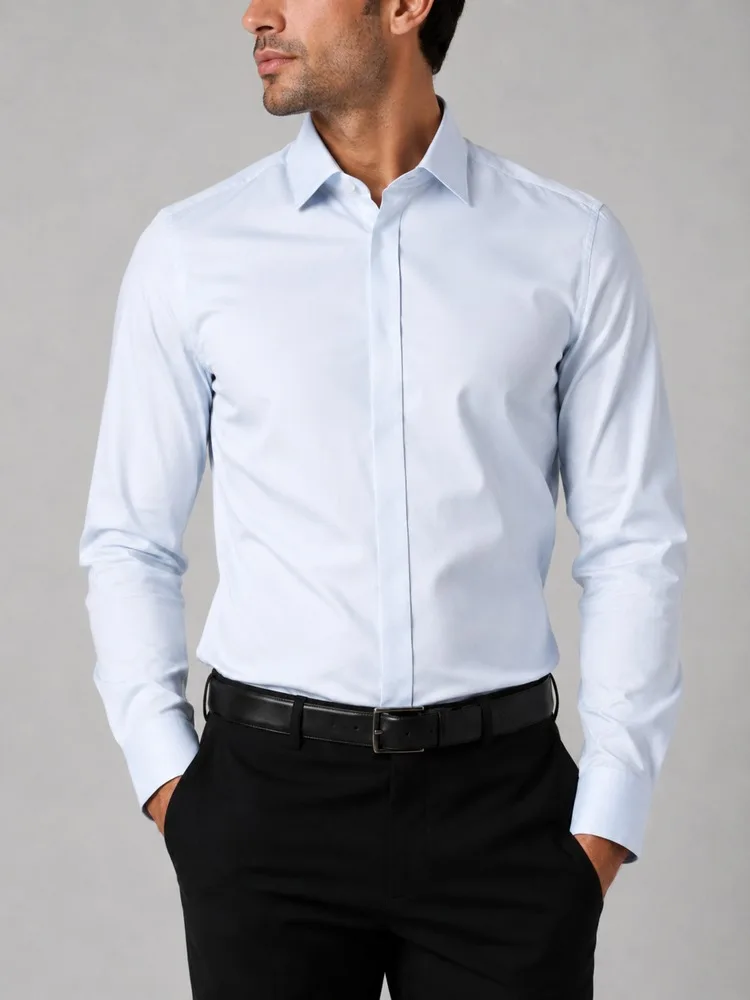 Men-formal-light-blue-shirt-with-hidden-buttons-heroshoop.webp پیراهن مردانه رسمی آبی روشن دکمه مخفی - تصویر 1