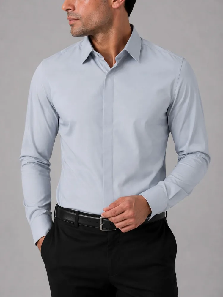 Men-ice-blue-shirt-with-hidden-button-heroshoop.webp پیراهن مردانه رسمی آبی یخی دکمه مخفی 27165 - تصویر 1