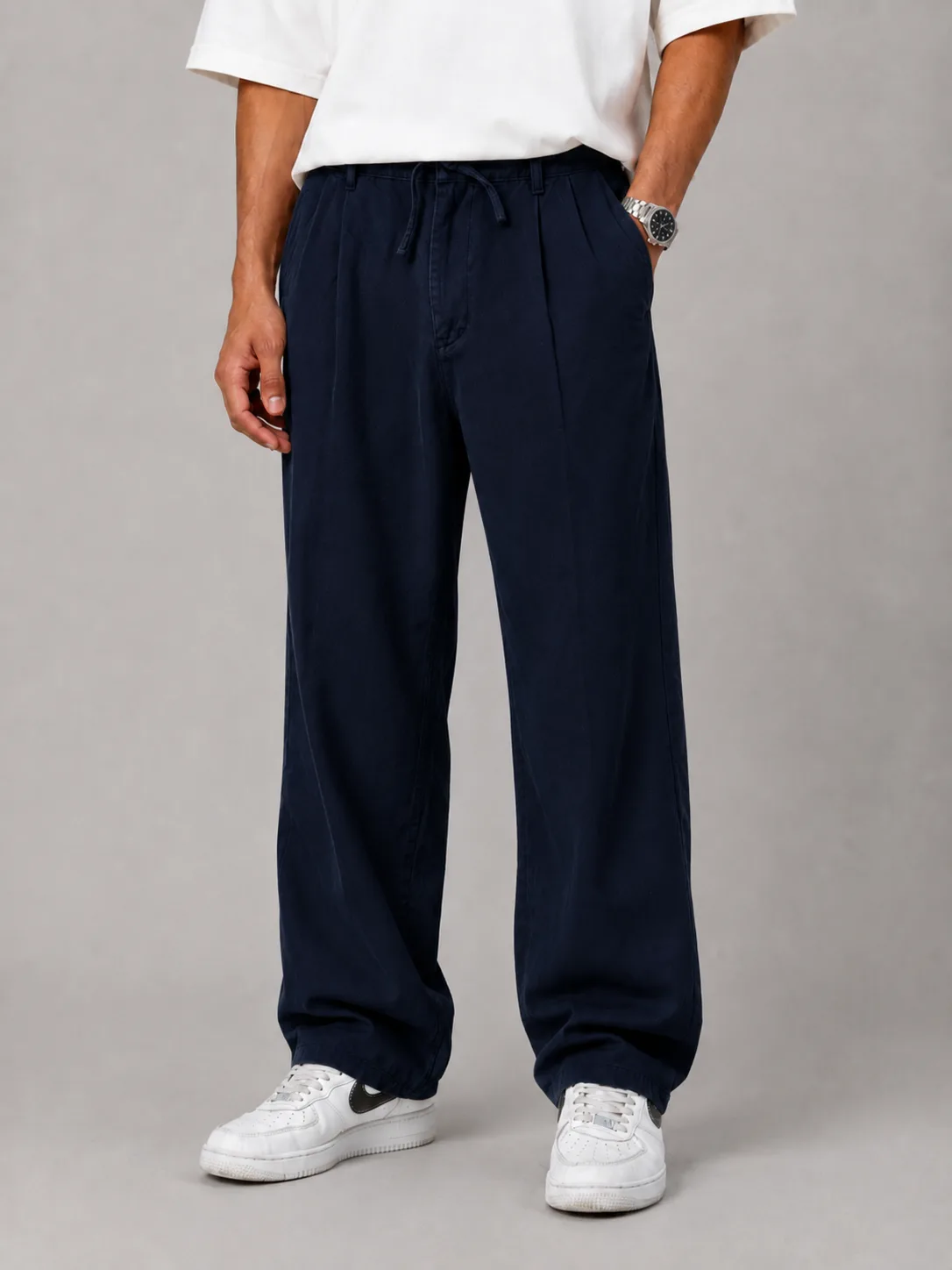 Navy-blue-lyocell-fabric-baggy-pants-with-cocoon-heroshoop.webp شلوار پارچه ای بگ استایل / پارچه لیوسل رنگ سرمه ای پیله دار - تصویر 1