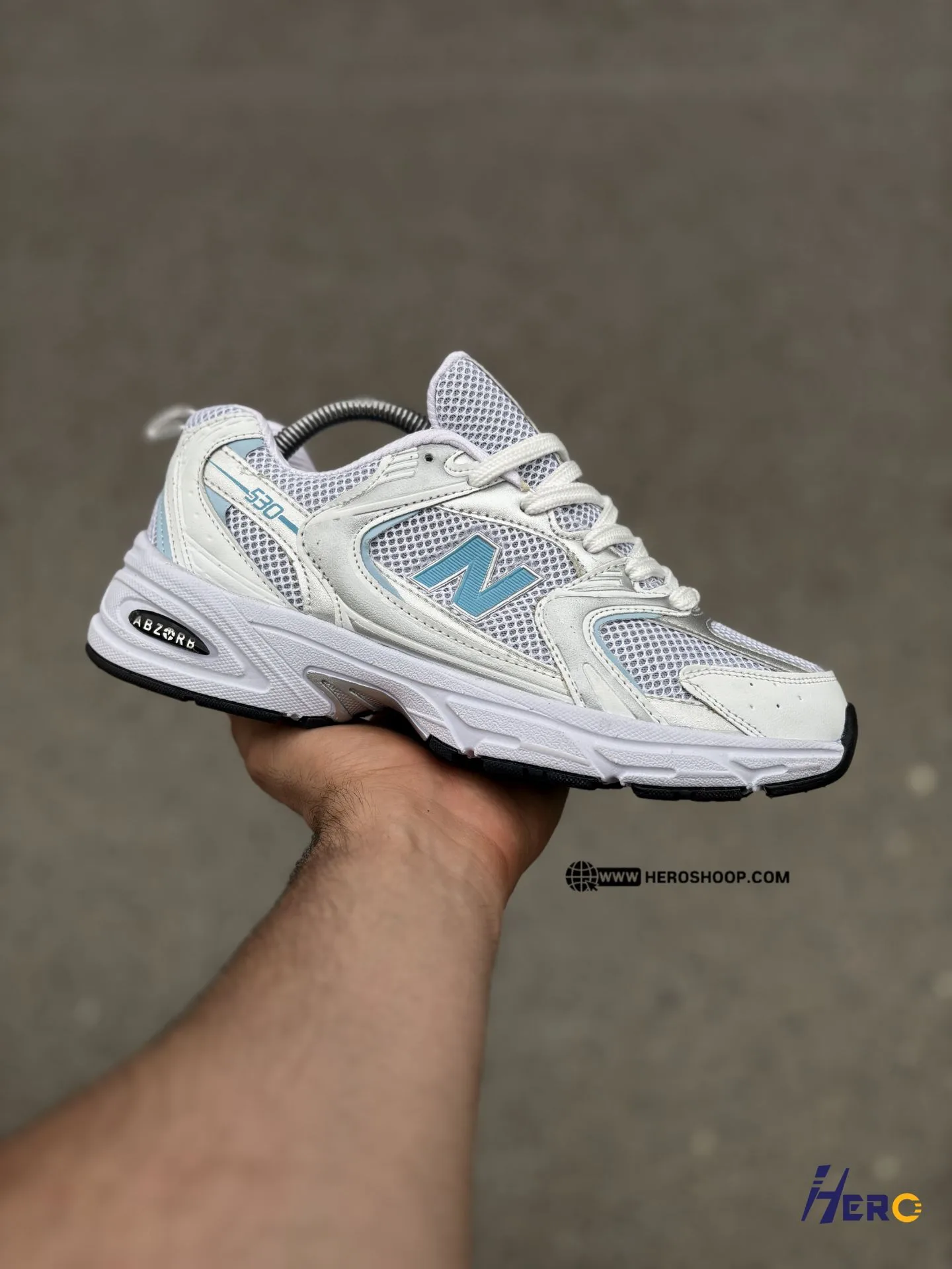 New-Balance-530-Running-Shoes-White-Blue-heroshoop.webp کتونی راحتی رانینگ نیوبالانس 530 / رنگ سفید ابی / کد 1195 - تصویر 1