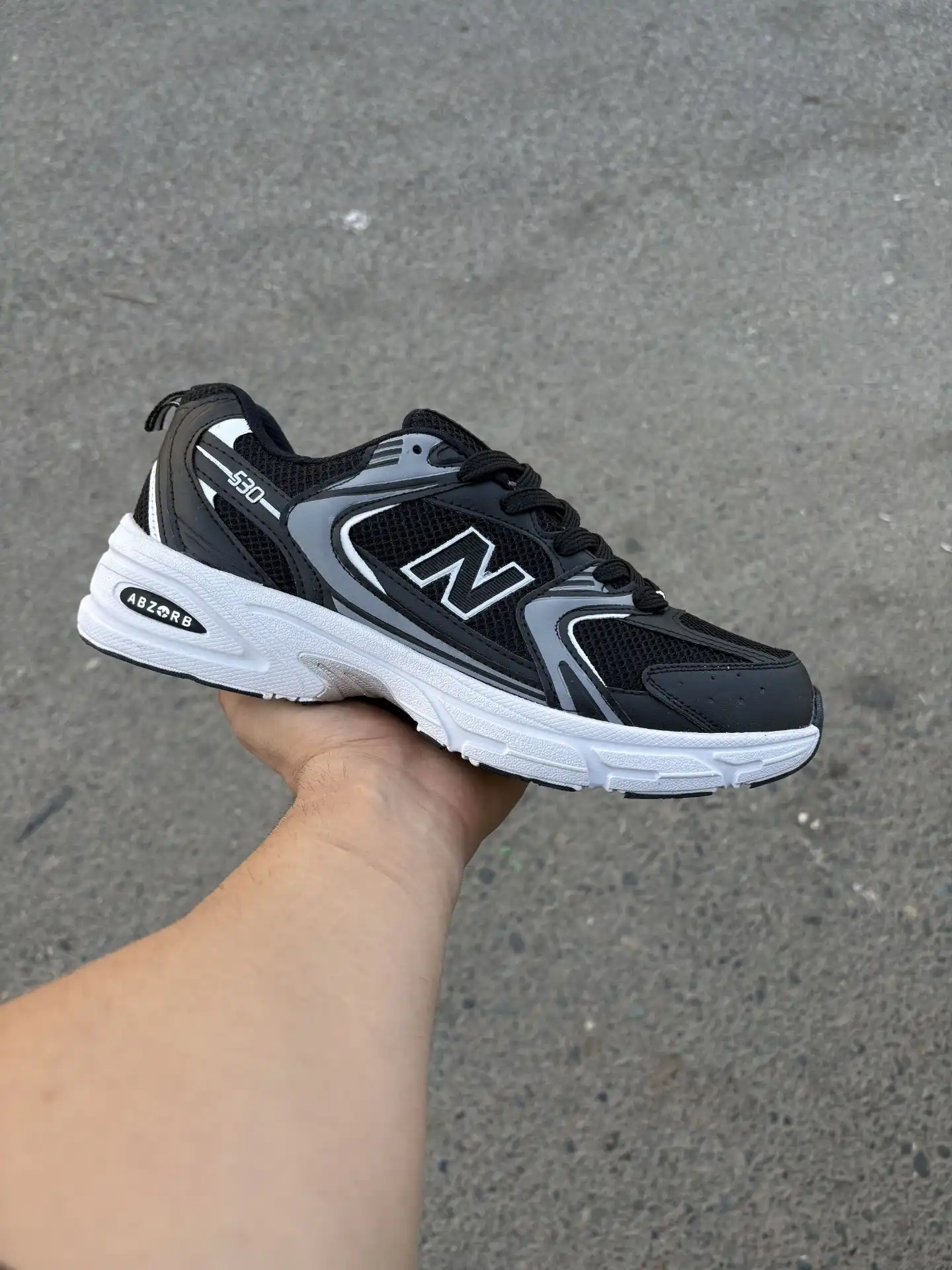 New-Balance-530-sneakers-black-gray-white-heroshoop.webp کتونی راحتی رانینگ بزرگپا نیوبالانس 530 سایز بزرگ 37 تا 47 / مشکی سفید طوسی - تصویر 1