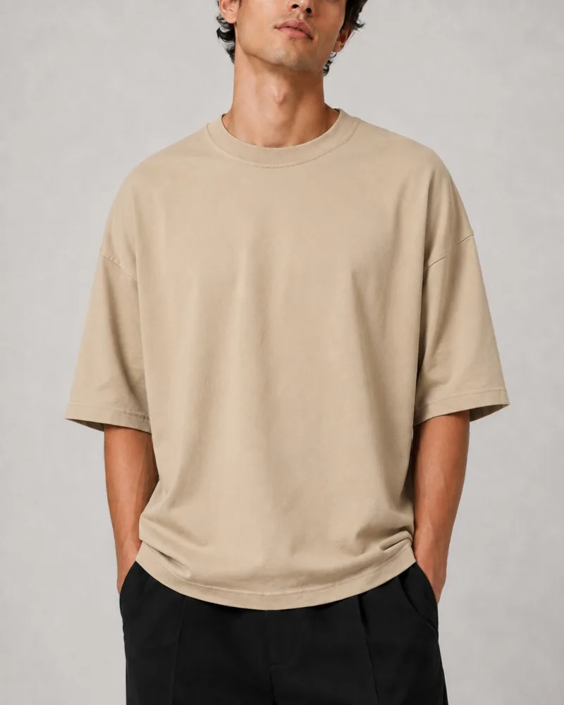 Simple-beige-cotton-T-shirt-with-two-thread-design-Heroshoop.webp تیشرت ساده پنبه دو نخ / رنگ کرم / کد 27133 - تصویر 1