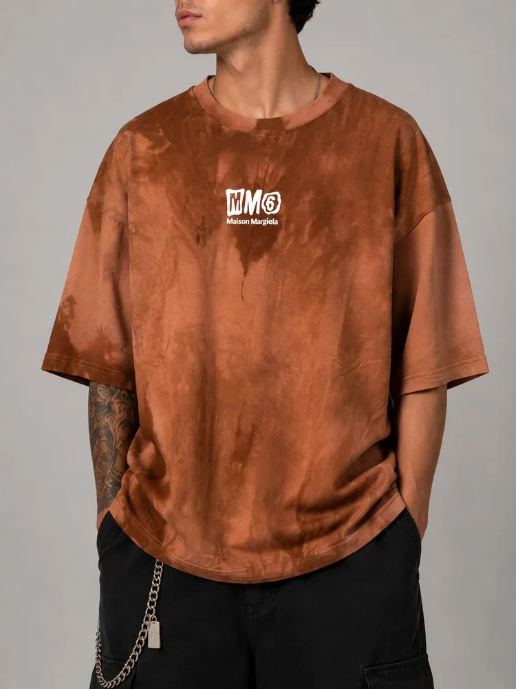 Watercolor-biscuit-pattern-sports-T-shirt-made-of-cotton-in-brown-color-heroshoop.webp تیشرت اسپرت آبرنگی پارچه پنبه بیسکوییتی / رنگ قهوه ای / کد 27146 - تصویر 1