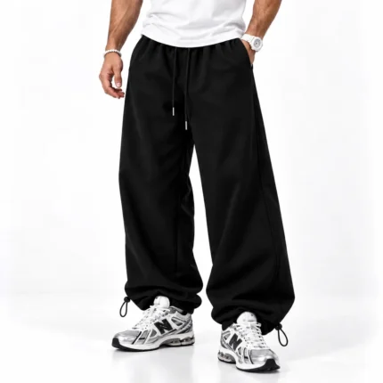 Baggy-Joggers-3-thread-cotton-French-terry-Length-110-cm-Elastic-waistband-Adjustable-toggle-cuffs-Color-Black-Code-8001-www.heroshoop.com-view-1.webp