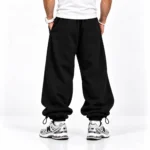 Baggy-Joggers-3-thread-cotton-French-terry-Length-110-cm-Elastic-waistband-Adjustable-toggle-cuffs-Color-Black-Code-8001-www.heroshoop.com-view-2.webp