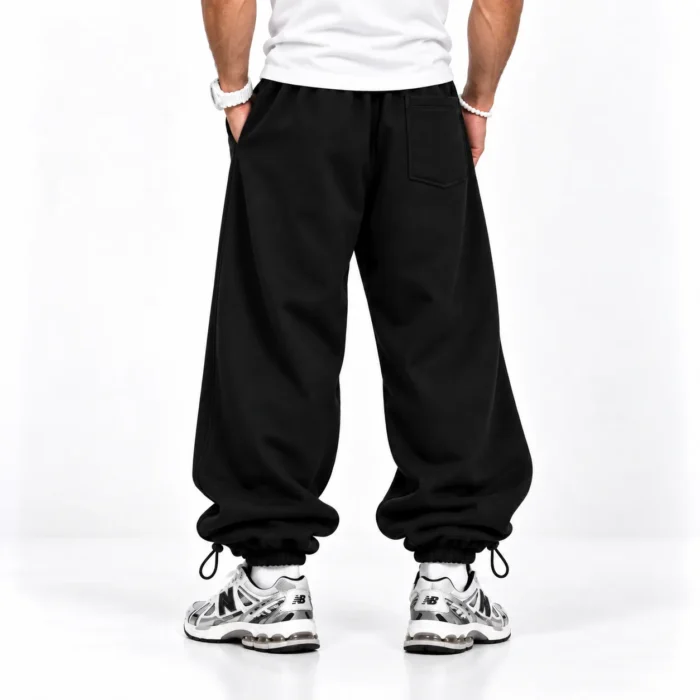 Baggy-Joggers-3-thread-cotton-French-terry-Length-110-cm-Elastic-waistband-Adjustable-toggle-cuffs-Color-Black-Code-8001-www.heroshoop.com-view-2.webp