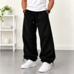 Baggy-style-joggers-Black-Adjustable-cuffs-with-toggles-3-thread-fleece-lined-cotton-Code-8001-www.heroshoop.com-view-1.webp