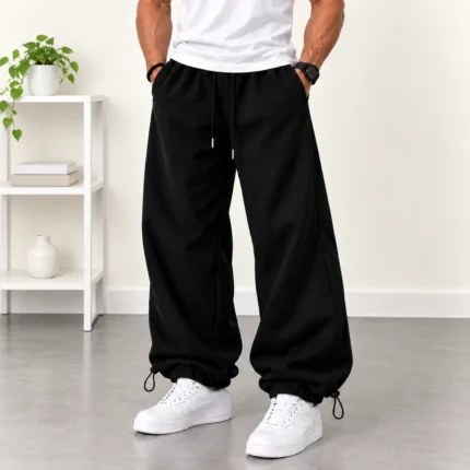 Baggy-style-joggers-Black-Adjustable-cuffs-with-toggles-3-thread-fleece-lined-cotton-Code-8001-www.heroshoop.com-view-1.webp