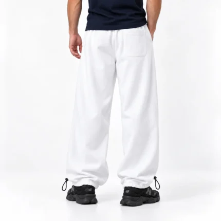 Baggy-style-sporty-joggers-Adjustable-hem-toggle-White-3-thread-cotton-French-terry-Unisex-www.heroshoop.com-view-2.webp
